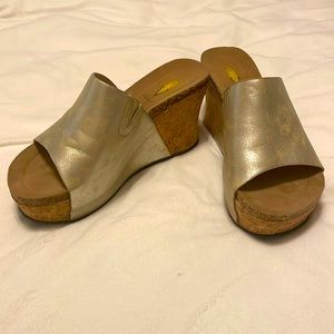 Volatile gold/silver platform wedges. 3 1/2 inches tall. Excellent condition!